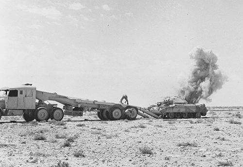 A British Crusader tank being recovered in Gazala 1942