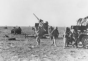 A German 88mm gun in action