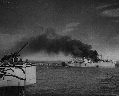 American cargo ship hit by German planes