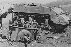 Knocked out American Stuart light reconnaissance tank