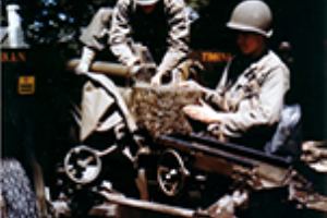 Browse 105mm howitzer being prepared for the amphibious operation