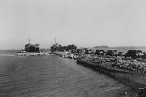 Transport vehicles boaring their LSTs