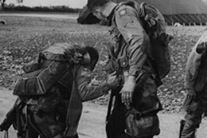 Browse US Airborne Soldiers preparing to embark their aircraft.