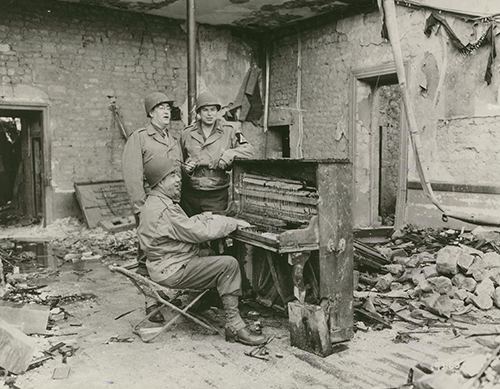 Soldiers playing piano