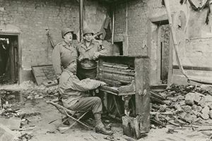 Soldiers playing piano