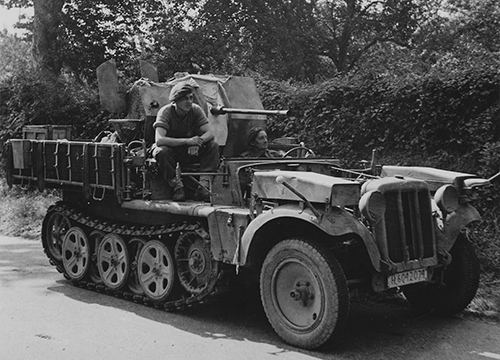 6th Airborne soldiers aboard a captured German half-track
