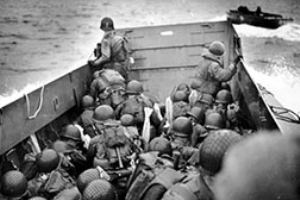 Browse US Infantry Divisions tackle rough swell en route to Omaha.