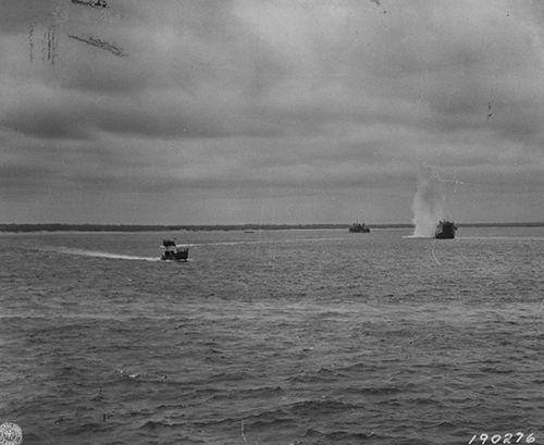 German 88mm bursts near an LST