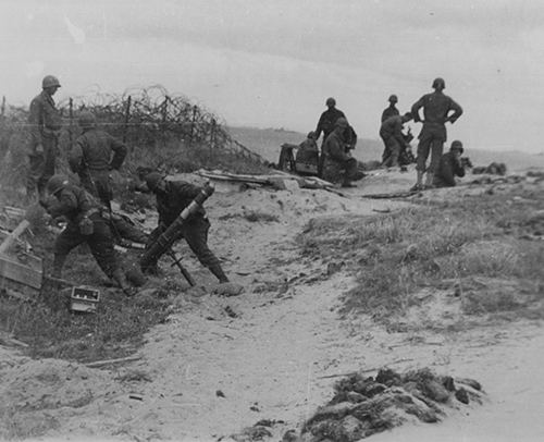 A 4.2 inch mortar in action on Utah Beach on D Day