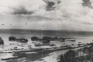 LST's unload at low tide