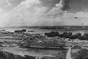 LST's unload at low tide