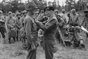 Montgomery decorates Colonel Charles Canham