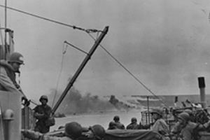 Smoke pours out of German defences on Omaha Beach