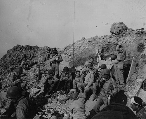 U.S. Army Rangers on top of the cliffs at Pointe du Hoc