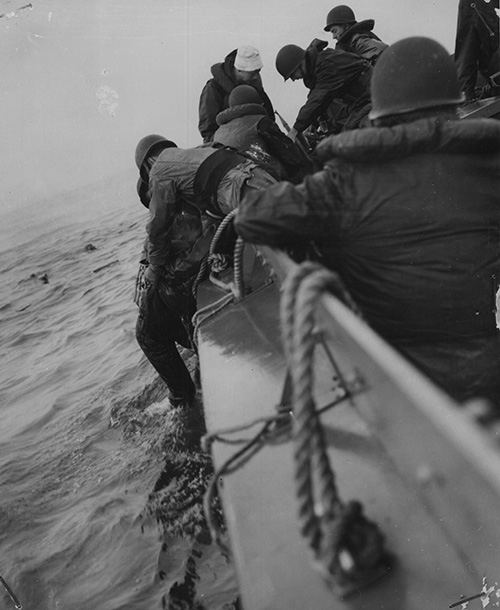 American soldiers being pulled from the sea