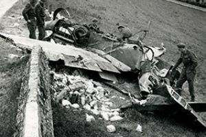 British troops inspect the wreckage of a Messerschmitt