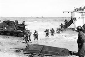 Browse Follow-up troops wade ashore from a landing craft