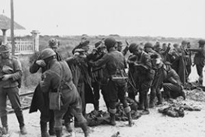 British Military Police search German prisoners