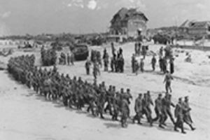 Browse German prisoners being marched across Nan White Beach
