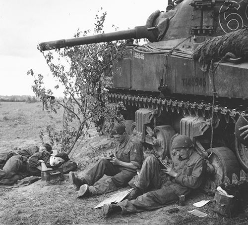 Sherman tank crew of 'C' Squadron, 13th/18th Royal Hussars