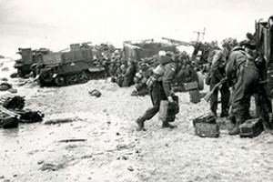 Men and machines take shelter from German fire on Sword Beach