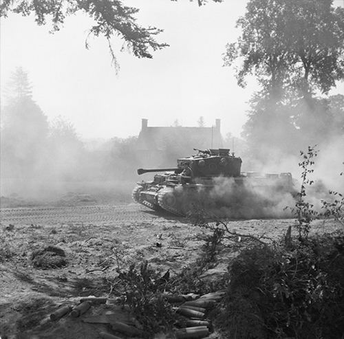 A Cromwell tank raises a cloud of dust