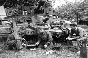 CLY crew cooking a meal