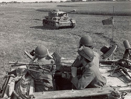 The crew of an armored recovery vehicle