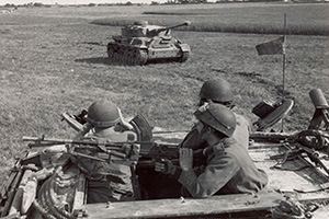 The crew of an armored recovery vehicle