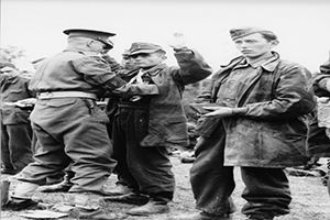 German prisoners being searched by Militay Police