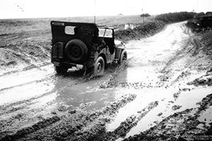 Mud on the road leading out of Cheux.