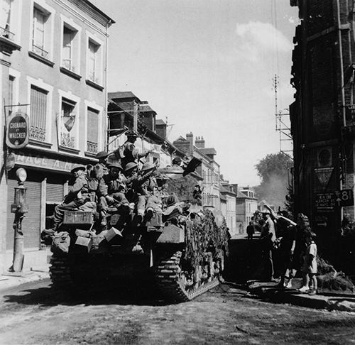 British troops passing through Gace.