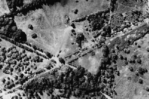 German vehicles at a crossroads near Orbec