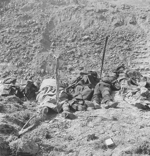 Canadian soldiers await burial