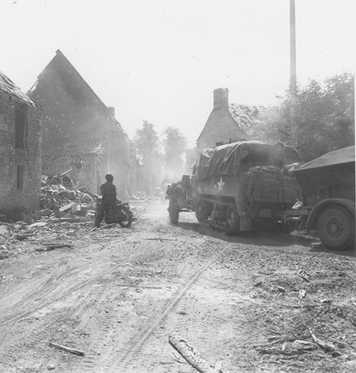 A Canadian half track towing a trailer