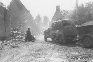 A Canadian half track towing a trailer