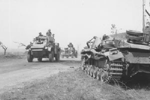Browse A convoy headed up by a Canadian armoured car