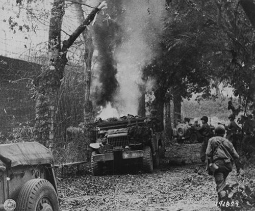 An American truck struck by artillery fire