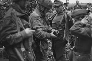 Captured German troops being searched (BU 1127)