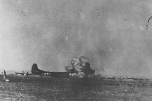A tow plane behind the Waco glider crash-lands and explodes