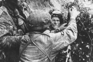 Paratroops in action with 3in. Mortars
