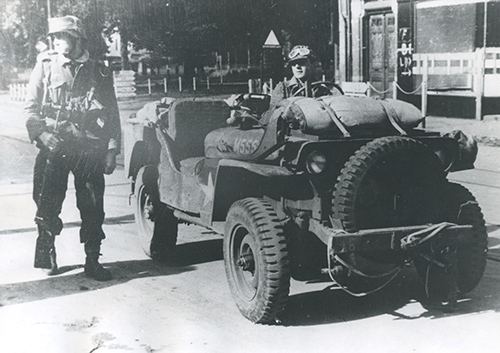German soldier seated in a British jeep