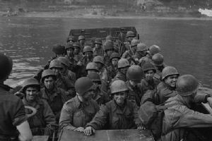 Landing craft carries US 3rd Infantrymen