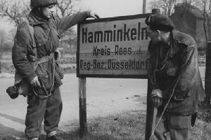 Airborne troops study a sign outside Hamminkeln