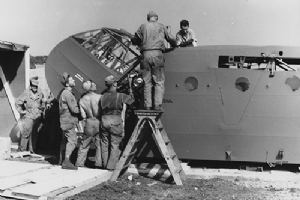 9th AF mechanics asemble a glider in France