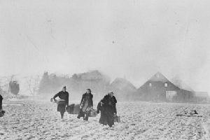 German farmers fleeing from their burning house