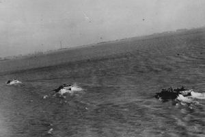 Buffalo amphibous trucks carrying British troops