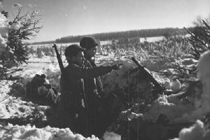 Two soldiers from the 36th Armored Infantry Regiment