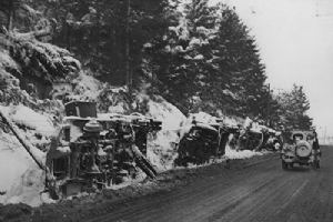 American and German Vehicles lay on a roadside