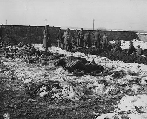 German prisoners of war dig graves